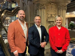 HAL’s Alex Pikardt with snr vp Rob Coleman and Hannah Baynes.